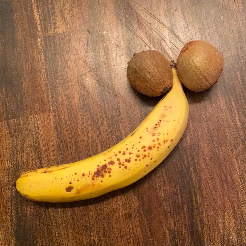 Two kiwis and a ripe banana!